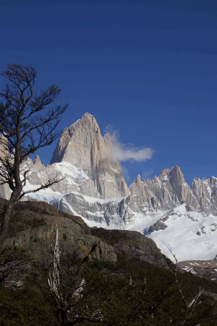 services-03 Majestic Mount Fitz Roy under clear blue sky in Patagonia landscape.
